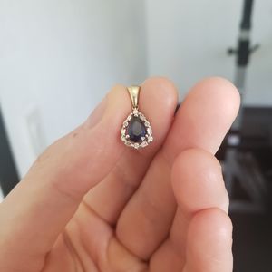 10k gold genuine sapphire and diamonds.